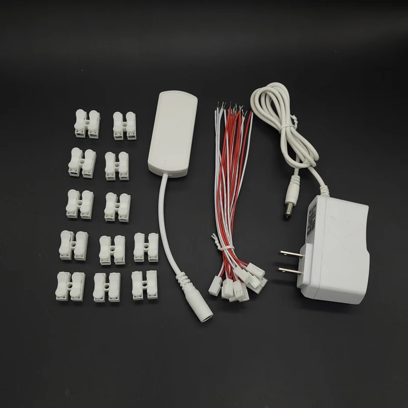 3V/5V/12V AC/DC Adapter Netzteil mit 12 Anschlüssen – Bild 5