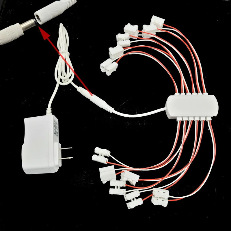 3V/5V/12V AC/DC Adapter Netzteil mit 12 Anschlüssen – Bild 2